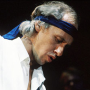 Mark Knopfler of Dire Straits.  ©†Michael Putland / Retna Ltd.